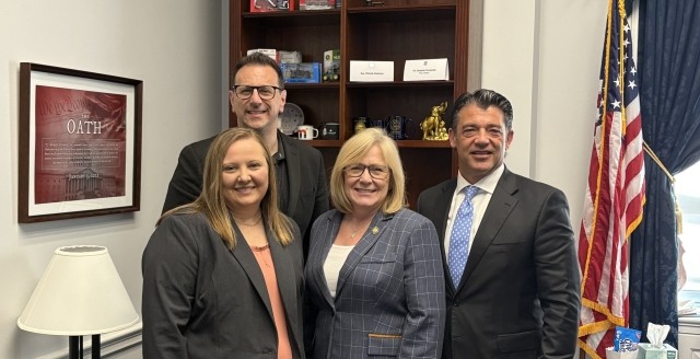 Credit union group with Rep. Fischbach